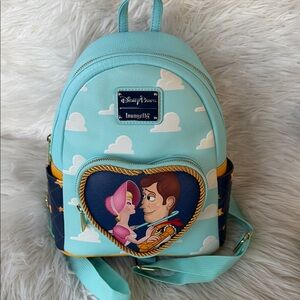 Loungefly Toy Story Backpack - Light Blue and Yellow